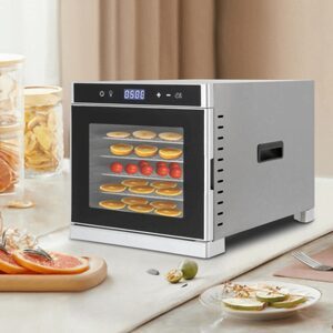 "Electric food dehydrator drying fruit slices for healthy snacks"